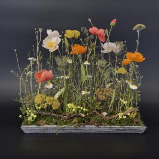 Wiesengesteck mit Mohnblüten